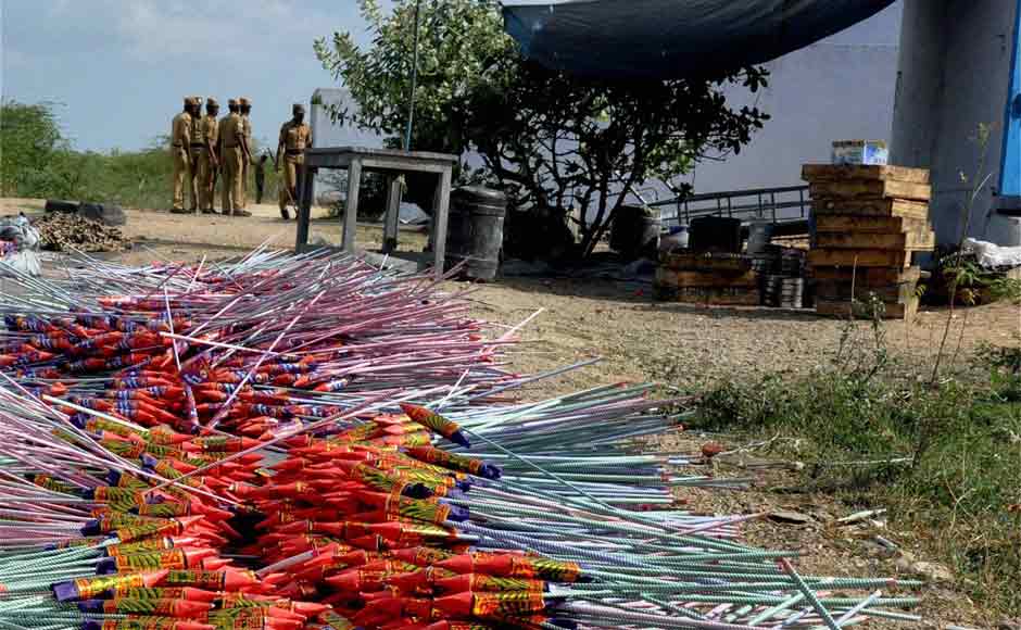 Policemen arrive at the site of a devastating blaze that raged through a fireworks factory on the outskirts of Sivakasi, Tamil Nadu on Wednesday. PTI Policemen arrive at the site of a devastating blaze that raged through a fireworks factory on the outskirts of Sivakasi, Tamil Nadu on Wednesday. PTI