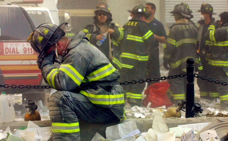 <br />A firefighter breaks down after the World Trade Center buildings collapsed on 11 September 2001 after two hijacked airplanes slammed into the twin towers in a terrorist attack. Mario Tama/Getty Images <br />A firefighter breaks down after the World Trade Center buildings collapsed on 11 September 2001 after two hijacked airplanes slammed into the twin towers in a terrorist attack. Mario Tama/Getty Images