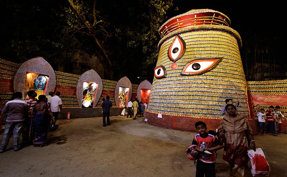 Devotees visit a pandal of the goddess Durga on during the Durga Puja festival in Kolkata. Bikas Das/AP Devotees visit a pandal of the goddess Durga on during the Durga Puja festival in Kolkata. Bikas Das/AP
