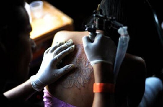 Scotland Yard bans officers from tattoos