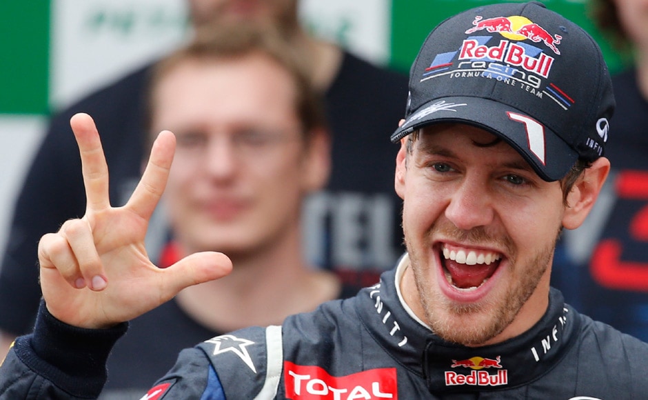 Red Bull Formula One driver Sebastian Vettel of Germany celebrates winning the world championship after the Brazilian F1 Grand Prix . Reuters Red Bull Formula One driver Sebastian Vettel of Germany celebrates winning the world championship after the Brazilian F1 Grand Prix . Reuters