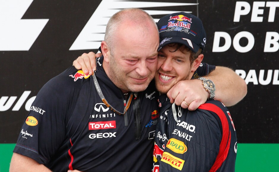 Vettel hugs team mechanic Darren Nicholls as they celebrate his win. Reuters Vettel hugs team mechanic Darren Nicholls as they celebrate his win. Reuters