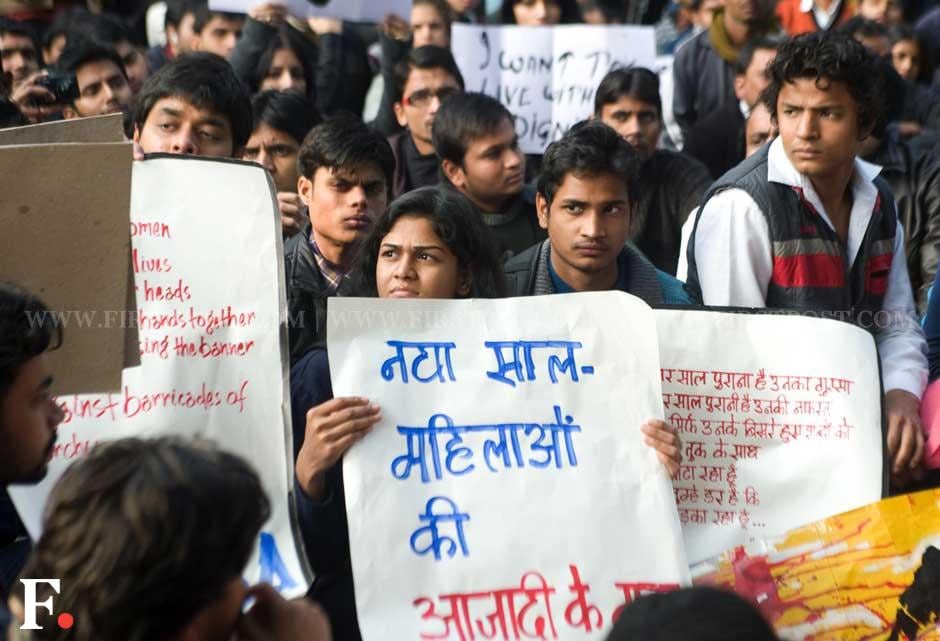 Students hold posters with messages demanding justice for rape victims. Naresh Sharma/Firstpost Students hold posters with messages demanding justice for rape victims. Naresh Sharma/Firstpost