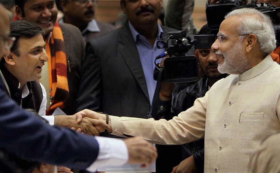 Gujarat Chief Minister Narendra Modi shakes hands with UP Chief Minister Akhilesh Yadav during the 57th National Development Council (NDC) meeting in New Delhi. PTI Gujarat Chief Minister Narendra Modi shakes hands with UP Chief Minister Akhilesh Yadav during the 57th National Development Council (NDC) meeting in New Delhi. PTI