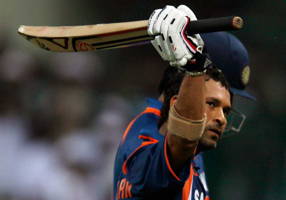India's Sachin Tendulkar raises his bat to acknowledge the cheering crowd as he walks back to the pavilion during the second one-day international between India and South Africa in Gwalior February 24, 2010. Tendulkar remains unbeaten at 200 runs to become the first man to score a double century in one-day internationals. Punit Paranjpe/Reuters. India's Sachin Tendulkar raises his bat to acknowledge the cheering crowd as he walks back to the pavilion during the second one-day international between India and South Africa in Gwalior February 24, 2010. Tendulkar remains unbeaten at 200 runs to become the first man to score a double century in one-day internationals. Punit Paranjpe/Reuters.