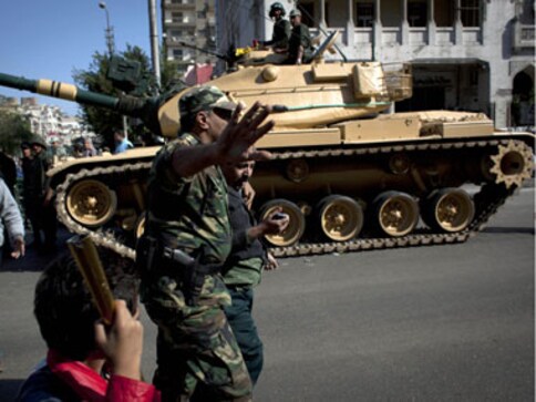 Egypt's army deploys tanks outside presidential palace