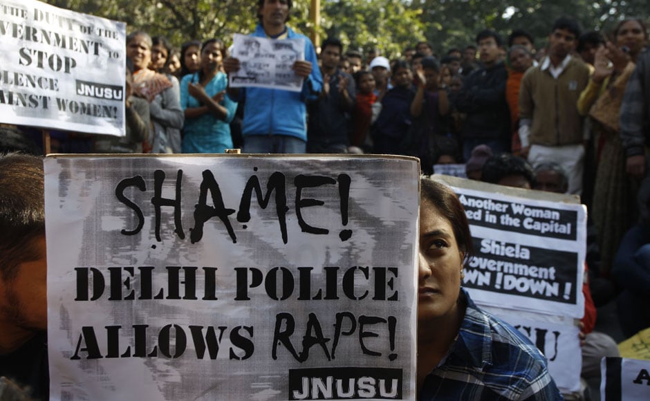 A woman participates in a protest rally condemning the gangrape in New Delhi on Tuesday. AP A woman participates in a protest rally condemning the gangrape in New Delhi on Tuesday. AP