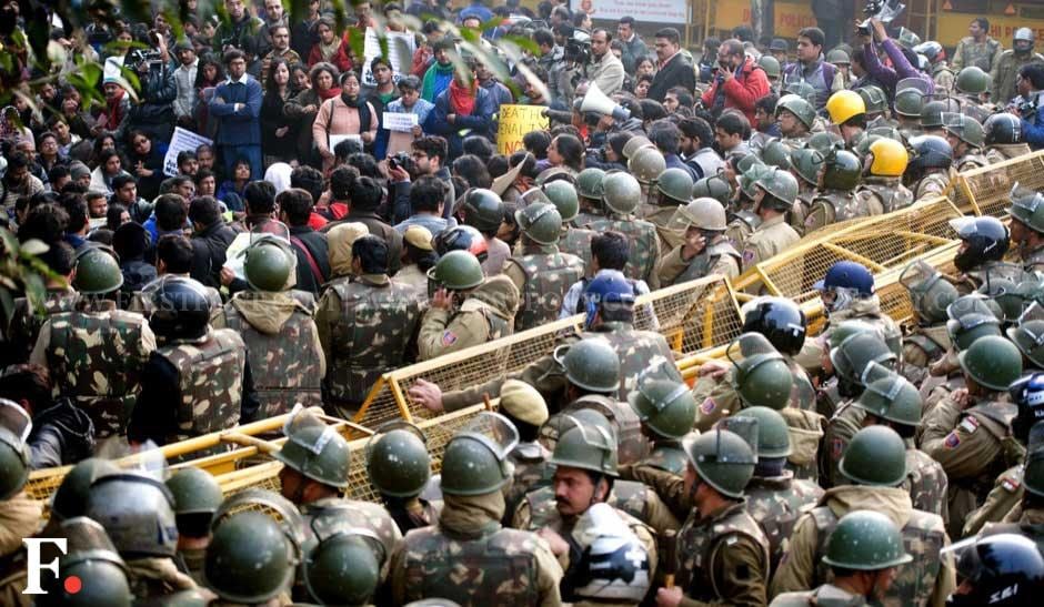Police personnel barricaded the approach road to India Gate to prevent protesters from reaching their intended . Naresh Sharma/Firstpost Police personnel barricaded the approach road to India Gate to prevent protesters from reaching their intended . Naresh Sharma/Firstpost