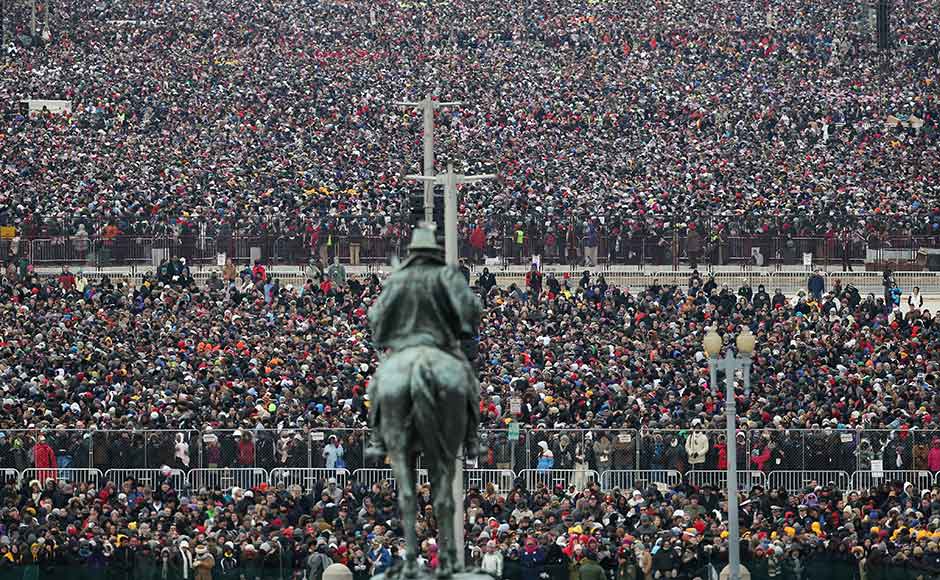 Crowds stand on the mall during the presidential inauguration on the West Front of the US Capitol. Justin Sullivan/Getty Images Crowds stand on the mall during the presidential inauguration on the West Front of the US Capitol. Justin Sullivan/Getty Images