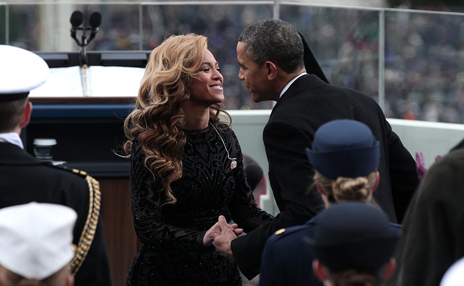 : U.S. President Barack Obama greets singer Beyonce after she performs the National Anthem during the public ceremonial inauguration on the West Front of the US Capitol. Win McNamee/ Getty Images : U.S. President Barack Obama greets singer Beyonce after she performs the National Anthem during the public ceremonial inauguration on the West Front of the US Capitol. Win McNamee/ Getty Images