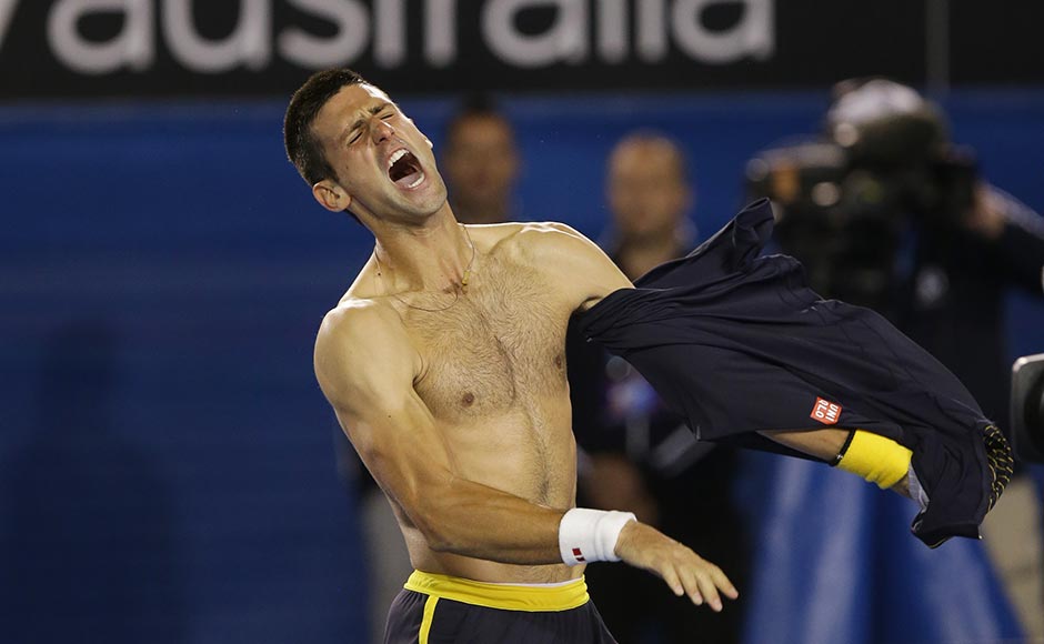 Serbia's Novak Djokovic rips his shirt off as he celebrates his fourth round win over Switzerland's Stanislas Wawrinka. Dita Alangkara/AP Serbia's Novak Djokovic rips his shirt off as he celebrates his fourth round win over Switzerland's Stanislas Wawrinka. Dita Alangkara/AP