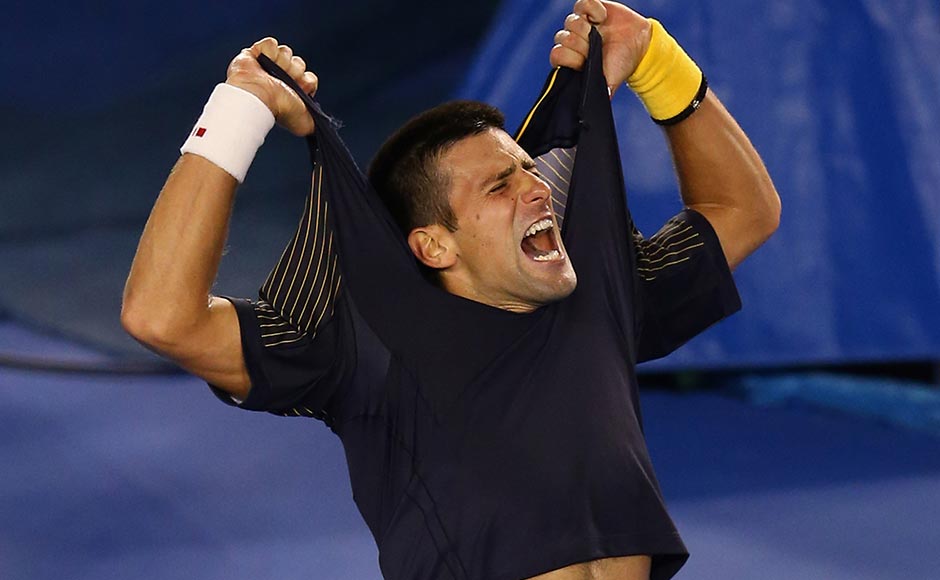 Novak Djokovic of Serbia rips his shirt off as he celebrates winning in five sets in his fourth round match against Stanislas Wawrinka of Switzerland. Julian Finney/Getty Images Novak Djokovic of Serbia rips his shirt off as he celebrates winning in five sets in his fourth round match against Stanislas Wawrinka of Switzerland. Julian Finney/Getty Images