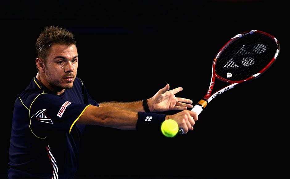 Stanislas Wawrinka of Switzerland plays a backhand in his fourth round match against Novak Djokovic. Robert Prezioso/ Getty Images Stanislas Wawrinka of Switzerland plays a backhand in his fourth round match against Novak Djokovic. Robert Prezioso/ Getty Images