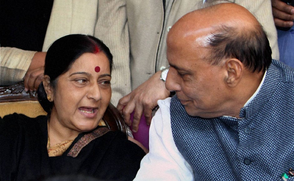 Sushma Swaraj and Rajnath Singh exchange a word during the protest at Jantar Mantar. PTI Sushma Swaraj and Rajnath Singh exchange a word during the protest at Jantar Mantar. PTI