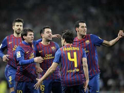 Barca march on, Ronaldo leads 10-man Real to win Barca march on, Ronaldo leads 10-man Real to win