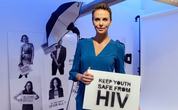 Images: Fight against AIDS gets Charlize Theron's Big Push at WEF Images: Fight against AIDS gets Charlize Theron's Big Push at WEF