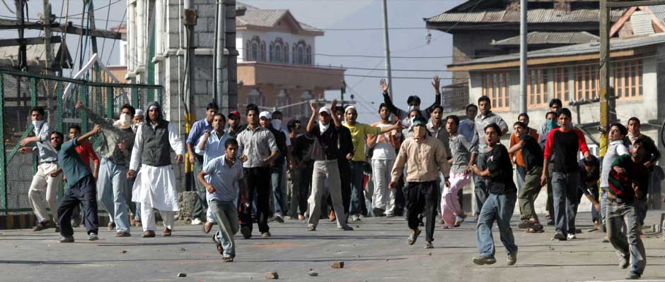 Kashmiri protesters throw stones at Indian police during a protest against the death sentence of Afzal Guru in Srinagar 6 October, 2006. Kashmir saw almost daily street protests after a Delhi court fixed the date for hanging Guru. Reuters Kashmiri protesters throw stones at Indian police during a protest against the death sentence of Afzal Guru in Srinagar 6 October, 2006. Kashmir saw almost daily street protests after a Delhi court fixed the date for hanging Guru. Reuters