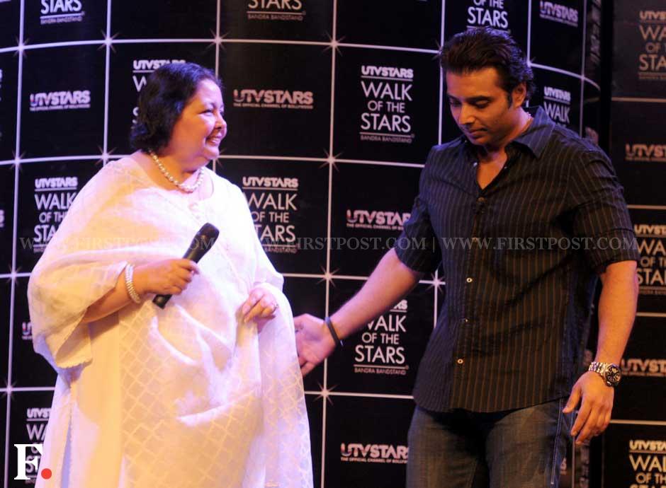 Uday Chopra lends a supportive arm to mother Pamela Chopra. Sachin Gokhale/Firstpost Uday Chopra lends a supportive arm to mother Pamela Chopra. Sachin Gokhale/Firstpost