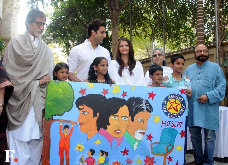 Amitabh Bachchan, son Abhishek, daughter-in-law Aishwarya, wife Jaya and filmmaker Govind Nihalani pose with children. Sachin Gokhale/ Firstpost Amitabh Bachchan, son Abhishek, daughter-in-law Aishwarya, wife Jaya and filmmaker Govind Nihalani pose with children. Sachin Gokhale/ Firstpost