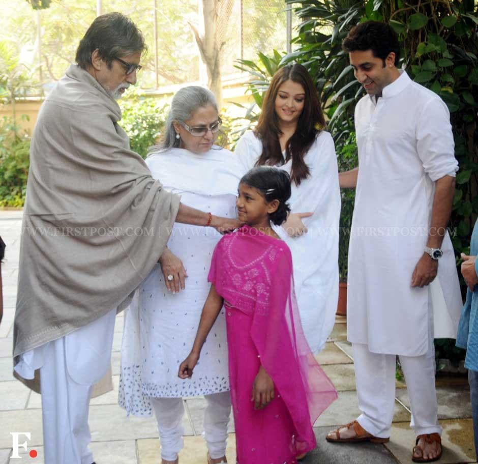 Amitabh Bachchan, son Abhishek, daughter-in-law Aishwarya, wife Jaya interact with a child at the event. Sachin Gokhale/ Firstpost Amitabh Bachchan, son Abhishek, daughter-in-law Aishwarya, wife Jaya interact with a child at the event. Sachin Gokhale/ Firstpost