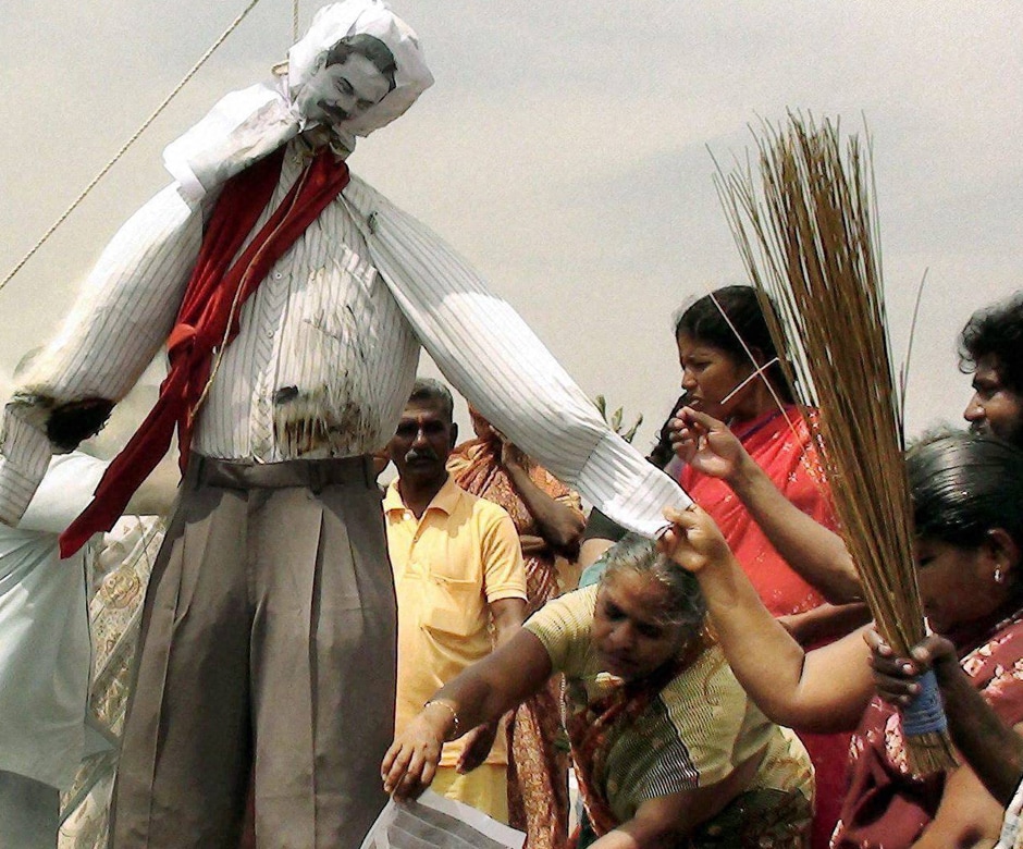 People hang an effigy of Sri Lankan President Mahinda Rajapaksa during a protest against his visit to India, in Idinthakarai. PTI People hang an effigy of Sri Lankan President Mahinda Rajapaksa during a protest against his visit to India, in Idinthakarai. PTI
