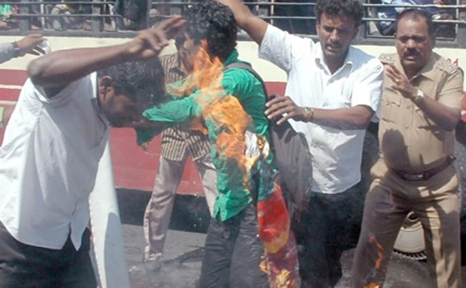Protesters burn Sri Lanka's national flag. Firstpost Protesters burn Sri Lanka's national flag. Firstpost