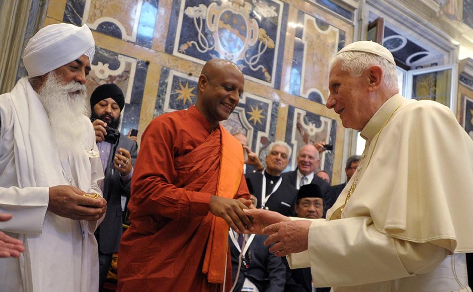 In this 28 October, 2011 file photo provided by the Vatican newspaper L'Osservatore Romano, Pope Benedict XVI receives a delegation of religious leaders from all over the world he met at a peace meeting in Assisi. AP In this 28 October, 2011 file photo provided by the Vatican newspaper L'Osservatore Romano, Pope Benedict XVI receives a delegation of religious leaders from all over the world he met at a peace meeting in Assisi. AP