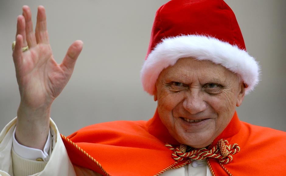 In this 21 December, 2005 file photo, Pope Benedict XVI, sporting a fur-trimmed hat, waves to pilgrims upon his arrival in St. Peter's Square at the Vatican for his weekly general audience. The red hat with white fur trimming, known in Italian as the "camauro," was popular among pontiffs in the 17th century. Alessandra Tarantino/AP In this 21 December, 2005 file photo, Pope Benedict XVI, sporting a fur-trimmed hat, waves to pilgrims upon his arrival in St. Peter's Square at the Vatican for his weekly general audience. The red hat with white fur trimming, known in Italian as the "camauro," was popular among pontiffs in the 17th century. Alessandra Tarantino/AP