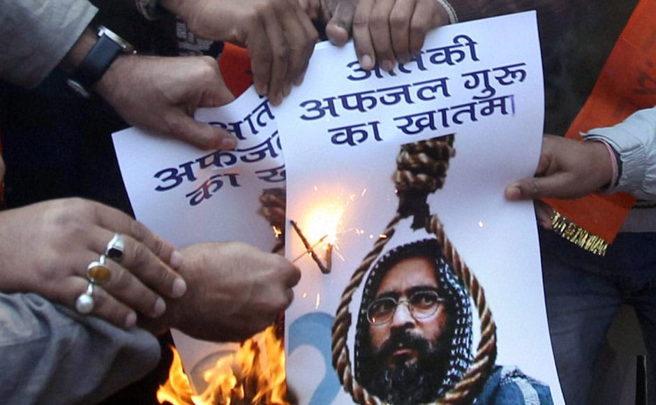 Bajrang Dal activists celebrate Afzal Guru's execution at a rally at Jantar Mantar in New Delhi. PTI Bajrang Dal activists celebrate Afzal Guru's execution at a rally at Jantar Mantar in New Delhi. PTI
