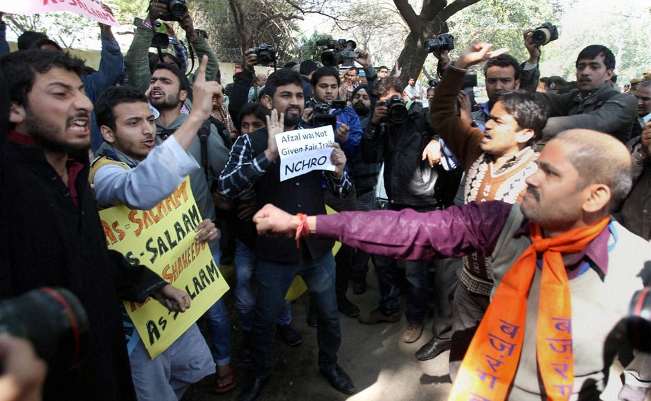 Bajrang Dal activists clash with a group of students who were demonstrating over the hanging of Afzal Guru at Jantar Mantar. PTI Bajrang Dal activists clash with a group of students who were demonstrating over the hanging of Afzal Guru at Jantar Mantar. PTI