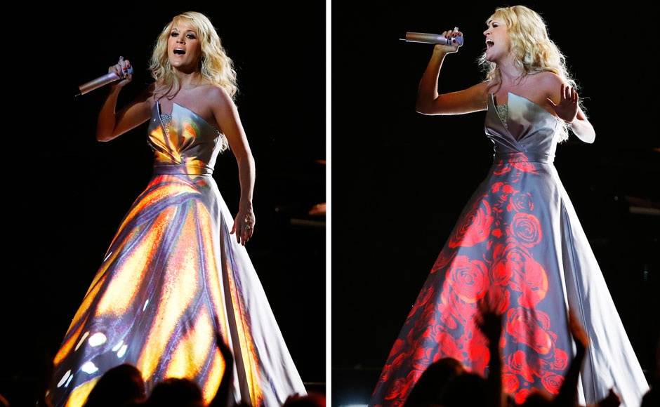 Carrie Underwood with different projections on her dress as she peforms at the 55th annual Grammy Awards in Los Angeles. Reuters Carrie Underwood with different projections on her dress as she peforms at the 55th annual Grammy Awards in Los Angeles. Reuters