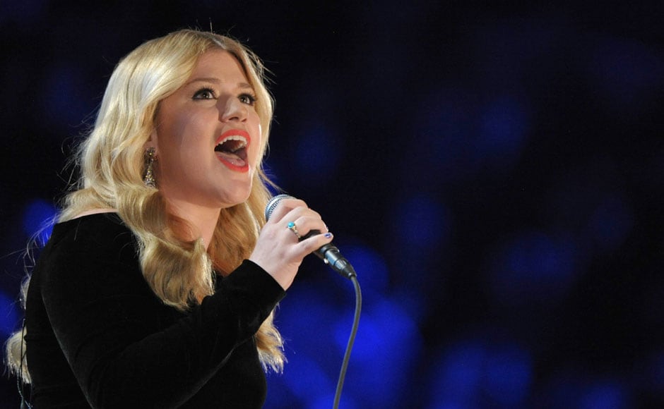 Kelly Clarkson performs at the award ceremony. AP Kelly Clarkson performs at the award ceremony. AP