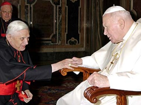 Pope Benedict avoids John Paul's show of suffering Pope Benedict avoids John Paul's show of suffering