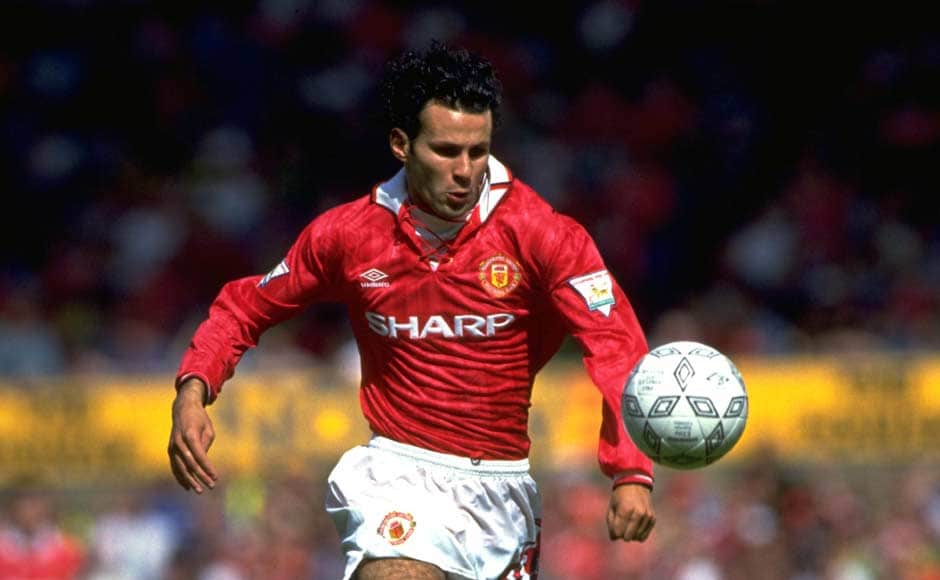 Breaking into the team in 1991, Ryan Giggs was quick to establish himself as a regular. Here he is, curly hair and unlimited energy on the left wing. Getty Images Breaking into the team in 1991, Ryan Giggs was quick to establish himself as a regular. Here he is, curly hair and unlimited energy on the left wing. Getty Images