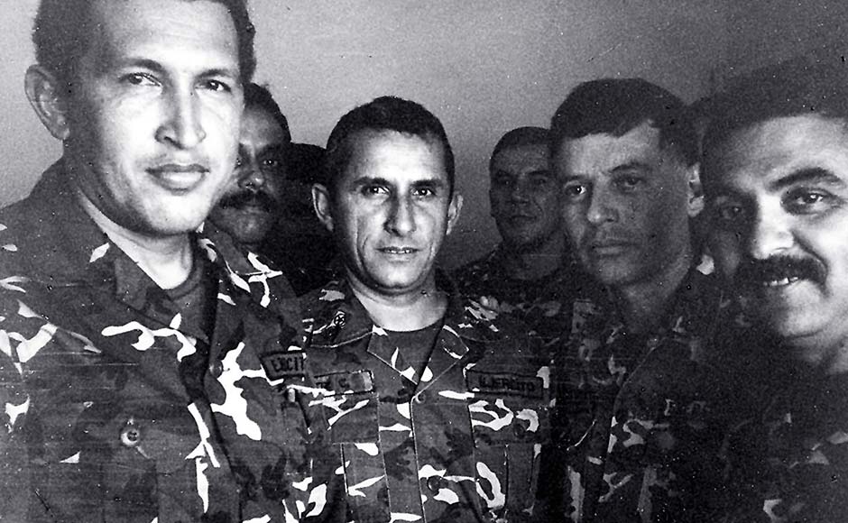 Venezuelan President Hugo Chavez (L) is shown in a 1992 file photo in jail after being arrested for a coup attempt. He stands next to Francisco Arias (2nd R), who is currently running for president, and former police chief Jesus Urdanetta (back center). File photo/Reuters Venezuelan President Hugo Chavez (L) is shown in a 1992 file photo in jail after being arrested for a coup attempt. He stands next to Francisco Arias (2nd R), who is currently running for president, and former police chief Jesus Urdanetta (back center). File photo/Reuters