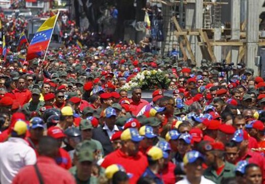 Mourners hail Hugo Chavez as spiritual father of Venezuela