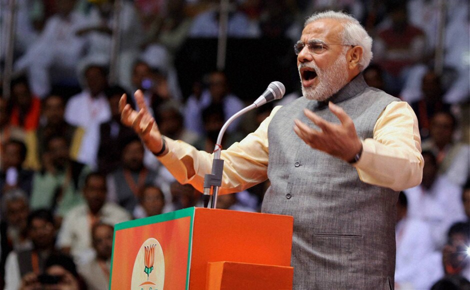 Gujarat Chief Minister Narendra Modi addressing on second day of Party National Council Meeting in New Delhi on Sunday. PTI Gujarat Chief Minister Narendra Modi addressing on second day of Party National Council Meeting in New Delhi on Sunday. PTI