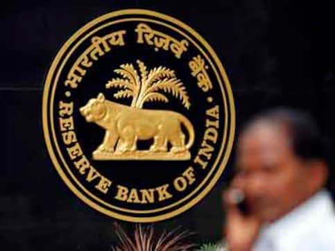 RBI gives banks time till July for issuing new format cheques RBI gives banks time till July for issuing new format cheques