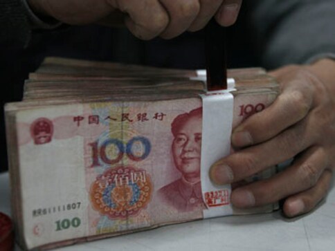 After Fitch downgrade, Moody's lowers China outlook