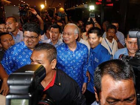 Malaysia's ruling coalition extends 56-year rule with election win Malaysia's ruling coalition extends 56-year rule with election win