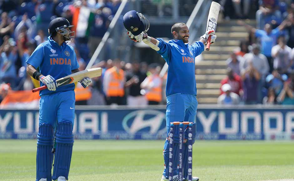 Shikhar Dhawan, right, reacts as he reaches his century, watched by teammate Virat Kohli. Alastair Grant/Associated Press Shikhar Dhawan, right, reacts as he reaches his century, watched by teammate Virat Kohli. Alastair Grant/Associated Press