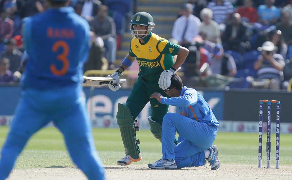 Ravindra Jadeja falls to the ground as South Africa's Robin Peterson pushes past for a single run during their group stage ICC Champions Trophy cricket match in Cardiff, Wales. Alastair Grant/ Associated Press Ravindra Jadeja falls to the ground as South Africa's Robin Peterson pushes past for a single run during their group stage ICC Champions Trophy cricket match in Cardiff, Wales. Alastair Grant/ Associated Press