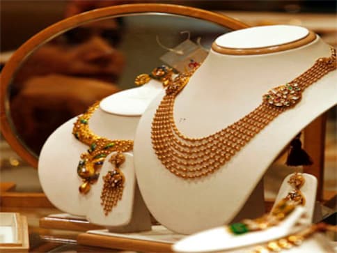 Under pressure to curb demand, RBI further tightens gold import norms Under pressure to curb demand, RBI further tightens gold import norms