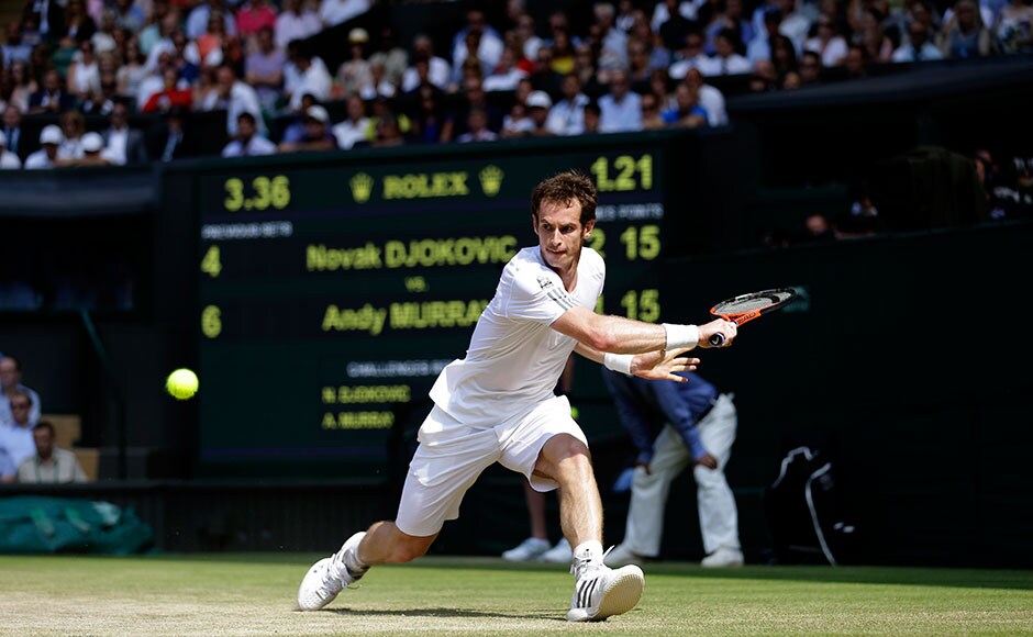 Andy Murray hits a backhand during his singles final against Novak Djokovic at Wimbledon. Murray outplayed Djokovic with his superb serve and forehand winners. Getty Images Andy Murray hits a backhand during his singles final against Novak Djokovic at Wimbledon. Murray outplayed Djokovic with his superb serve and forehand winners. Getty Images