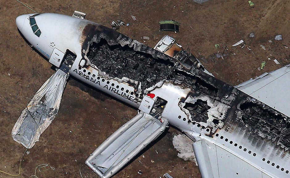 Rescue officials stand near an Asiana Airlines Boeing 777 plane after it crashed while landing at San Francisco International Airport in California. The Boeing 777, which had flown from Seoul, South Korea, was carrying 307 people. Jed Jacobsohn/Reuters Rescue officials stand near an Asiana Airlines Boeing 777 plane after it crashed while landing at San Francisco International Airport in California. The Boeing 777, which had flown from Seoul, South Korea, was carrying 307 people. Jed Jacobsohn/Reuters