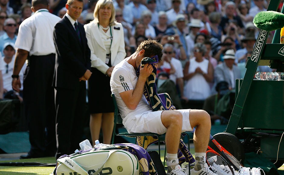 Andy Murray reacts before the trophy presentation after defeating Novak Djokovic to win Wimbledon. Kirsty Wigglesworth/Associated Press Andy Murray reacts before the trophy presentation after defeating Novak Djokovic to win Wimbledon. Kirsty Wigglesworth/Associated Press