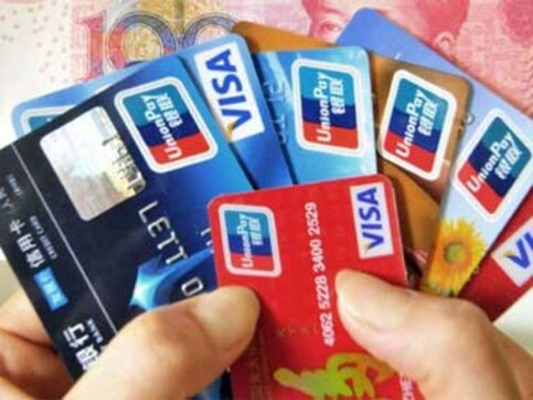 SIT on black money: Govt should make credit, debit card mandatory to pay bills; move will curb use of unaccounted money SIT on black money: Govt should make credit, debit card mandatory to pay bills; move will curb use of unaccounted money