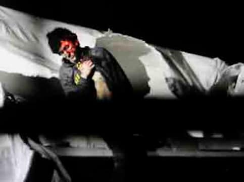 New photos of Boston bomber give glimpses into end of manhunt New photos of Boston bomber give glimpses into end of manhunt
