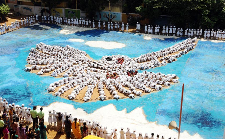 About 1500 children from a private school at Kolathur near Chennai today created a dove as a symbolic protest against the division of Andhra Pradesh. Firstpost About 1500 children from a private school at Kolathur near Chennai today created a dove as a symbolic protest against the division of Andhra Pradesh. Firstpost