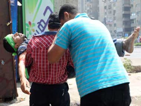Egypt: Clashes between protesters, troops leave close to 300 dead Egypt: Clashes between protesters, troops leave close to 300 dead